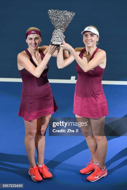 Lyudmyla Kichenok of Ukraine and Nadiia Kichenok of Ukraine celebrate with their trophy during the Award Ceremony after winning the women's doubles...