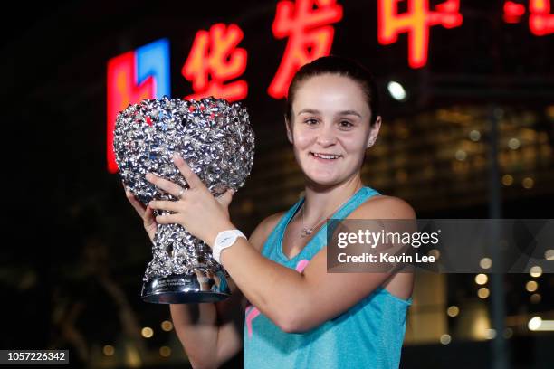 Ashleigh Barty of Australia poses with her trophy outside The Zhuhai Hengqin International Tennis Centre after winning the Women's Single final match...