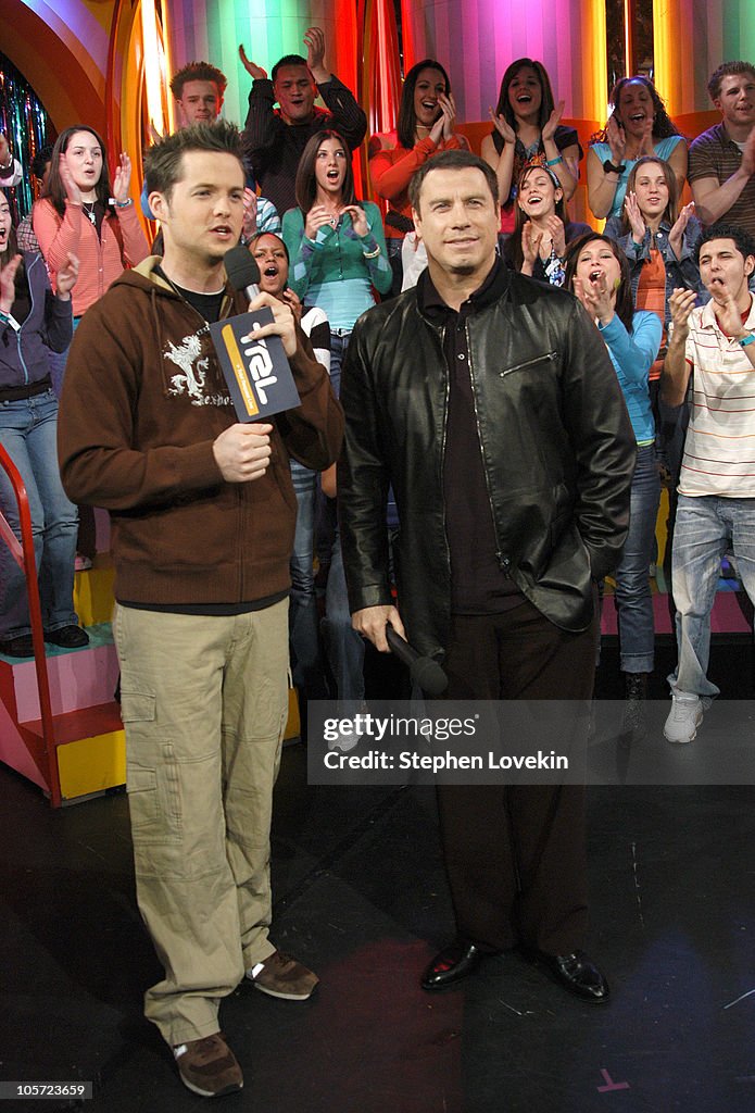 John Travolta and Rachel Bilson Visit MTV's "TRL" - February 23, 2005