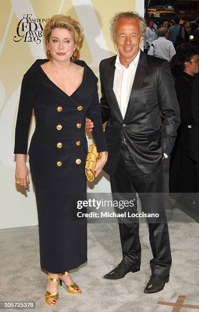 Catherine Deneuve and Gilles Bensimon during 2005 CFDA Fashion Awards - Arrivals at The New York Public Library in New York City, New York, United...