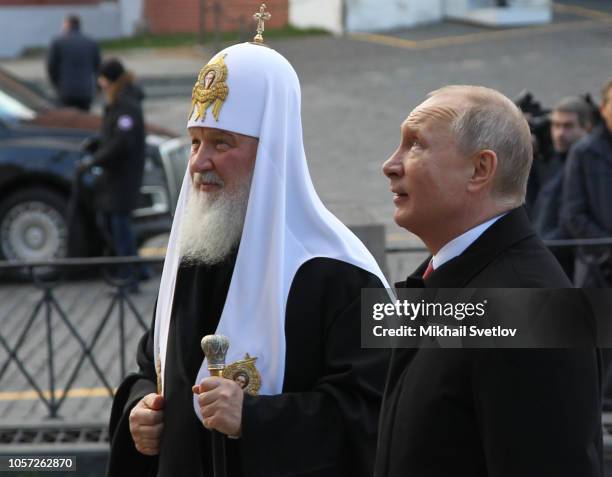 Russian President Vladimir Putin and Russian Orthodox Patriarch Kirill put flowers to the monunent of Kuzma Minin and Dmitry Pozharsky, the leaders...