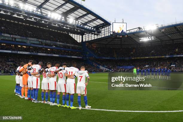 Chelsea and Crystal Palace players observe a minutes silence in memory of Leicester City Chairman Vichai Srivaddhanaprabha prior to the Premier...
