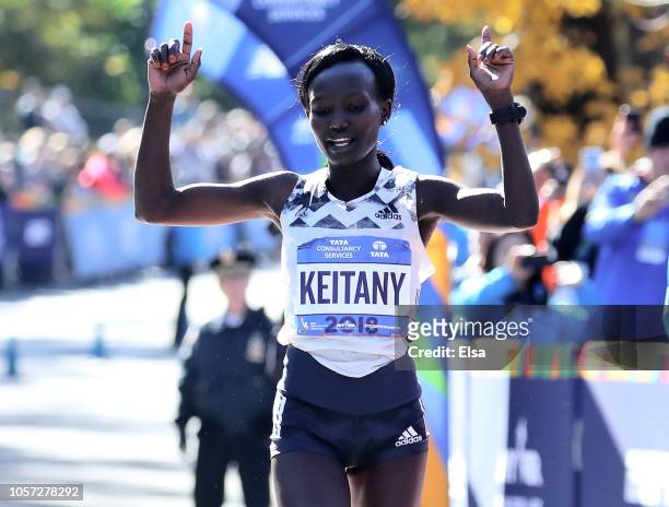 Mary Keitany of Kenya crosses the finish line to win the Women's Division of the 2018 TCS New York City Marathon on November 4, 2018 in Central Park...