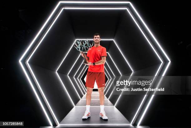 Karen Khachanov of Russia poses with the trophy after winning the Rolex Paris Masters Final against Novak Djokovic of Serbia during Day 7 of the...