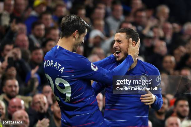 Alvaro Morata of Chelsea celebrates with teammate Eden Hazard after scoring his team's second goal during the Premier League match between Chelsea FC...