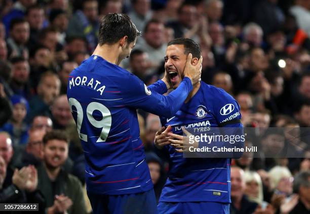 Alvaro Morata of Chelsea celebrates with teammate Eden Hazard after scoring his team's second goal during the Premier League match between Chelsea FC...