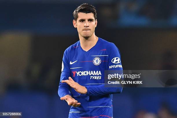 Chelsea's Spanish striker Alvaro Morata applauds supporters on the pitch after the English Premier League football match between Chelsea and Crystal...