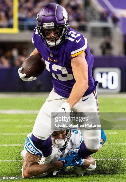 Chad Beebe of the Minnesota Vikings is tackled with the ball in the first quarter of the game against the Detroit Lions at U.S. Bank Stadium on...