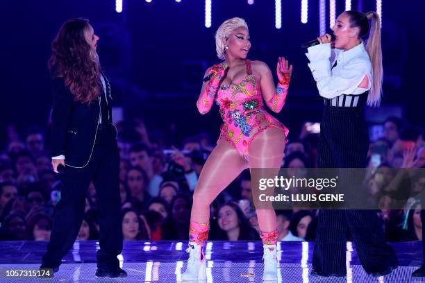 Trinidadian-US rapper Nicki Minaj performs with British group Little Mix during the MTV Europe Music Awards at the Bizkaia Arena in the northern...