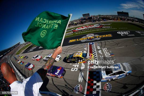Ryan Blaney, driver of the Accella/Carlisle Ford, leads the field to green to start during the Monster Energy NASCAR Cup Series AAA Texas 500 at...