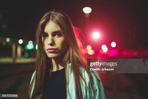 young woman on train station - 15 year old model stock pictures, royalty-free photos & images