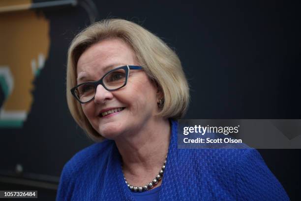 Senator Claire McCaskill fields questions from reporters following a campaign stop outside a Walmart store on November 4, 2018 in St. Louis,...