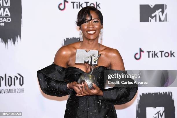 Tiwa Savage poses with Best African Act Award in the Winners room during the MTV EMAs 2018 at Bilbao Exhibition Centre on November 4, 2018 in Bilbao,...