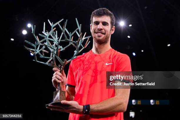 Karen Khachanov of Russia poses with the trophy after winning the Rolex Paris Masters Final against Novak Djokovic of Serbia during Day 7 of the...