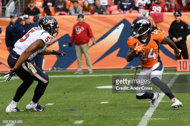 Adam Jones of the Denver Broncos makes a move during kick return in the second quarter. The Denver Broncos hosted the Houston Texans at Broncos...
