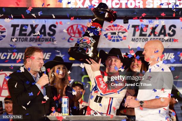 Kevin Harvick, driver of the Mobil 1 Ford, celebrates in victory lane after winning the Monster Energy NASCAR Cup Series AAA Texas 500 at Texas Motor...