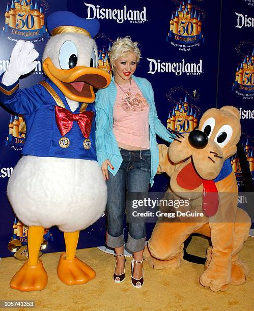 Christina Aguilera with Pluto and Donald Duck during Disneyland 50th Anniversary "Happiest Homecoming On Earth" Celebration at Disneyland in Anaheim,...