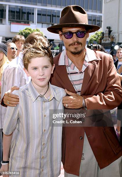 Freddie Highmore and Johnny Depp during "Charlie and the Chocolate Factory" Los Angeles Premiere - Chocolate Carpet at Grauman's Chinese Theatre in...