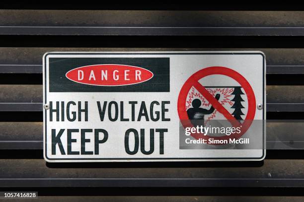 'danger: high voltage - keep out' sign - osha hazard communication pictogram stock pictures, royalty-free photos & images