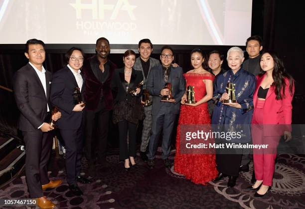 Sterling K. Brown poses with Ronny Chieng, Jimmy O. Yang, Michelle Yeoh, Henry Golding, Nico Santos, Constance Wu, Ken Jeong, Lisa Lu, Harry Shum...