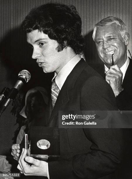 Actor receiving and award from Cary Grant during 3rd Annual Straw Hat Awards at Tavern on the Green in New York City, New York, United States.