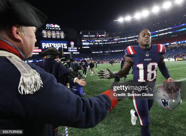 New England Patriots' Matthew Slater high fives the End Zone Militia after New England's 31-17 victory. The New England Patriots host the Green Bay...