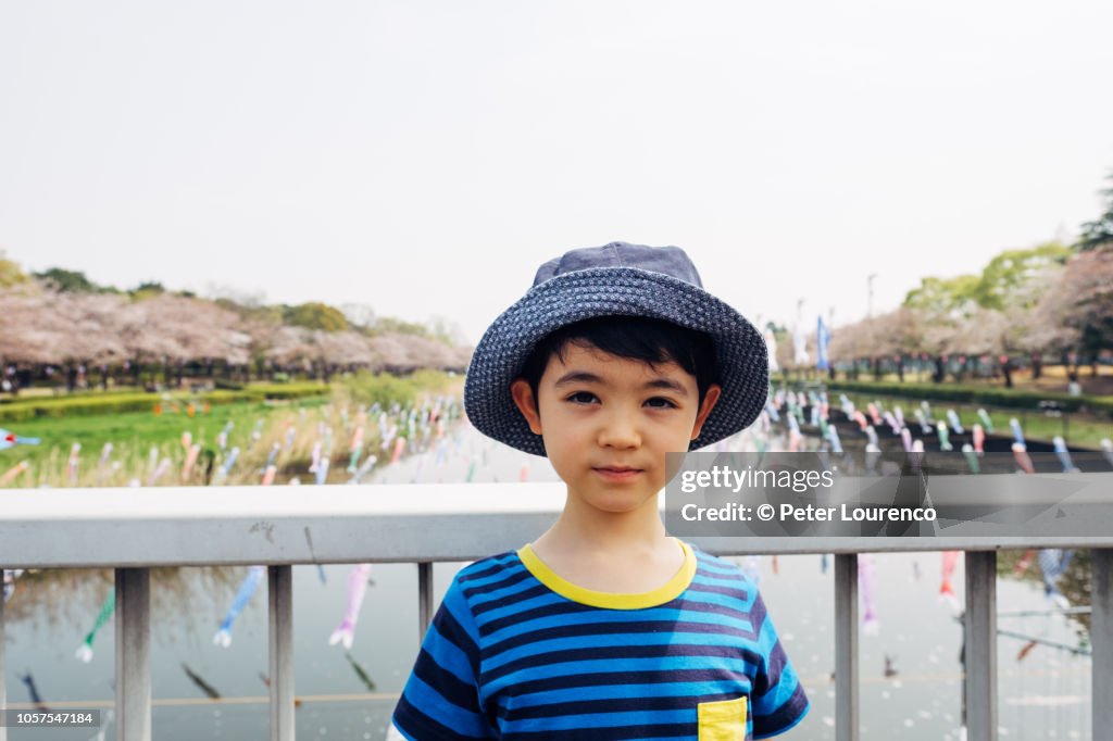 Boy at Japanese park in Springtime.