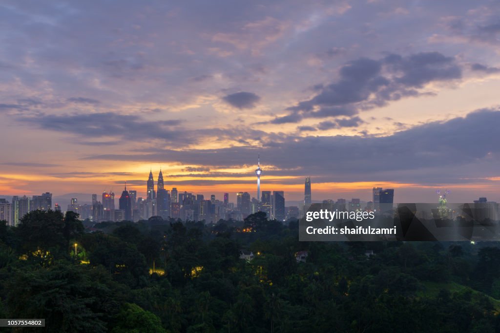 View of cloudy sunrise over downtown Kuala Lumpur, Malaysia