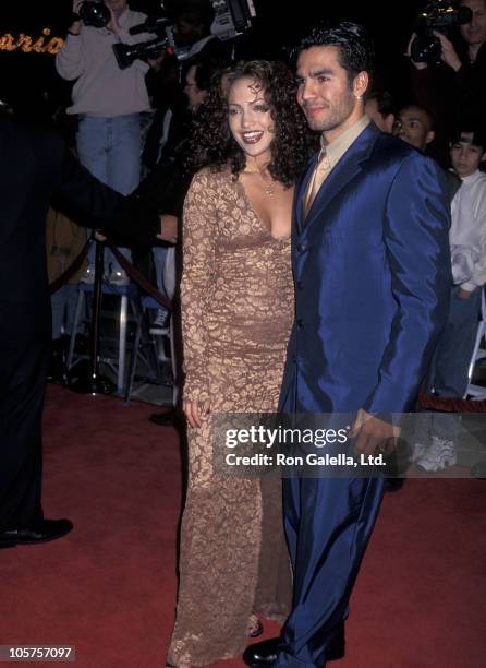 Actress Jennifer Lopez and husband Ojani Noa attend the "Anaconda" Westwood Premiere on April 7, 1997 at Mann Village Theatre in Westwood, California.