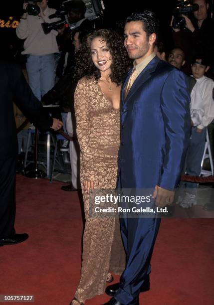 Actress Jennifer Lopez and husband Ojani Noa attend the "Anaconda" Westwood Premiere on April 7, 1997 at Mann Village Theatre in Westwood, California.