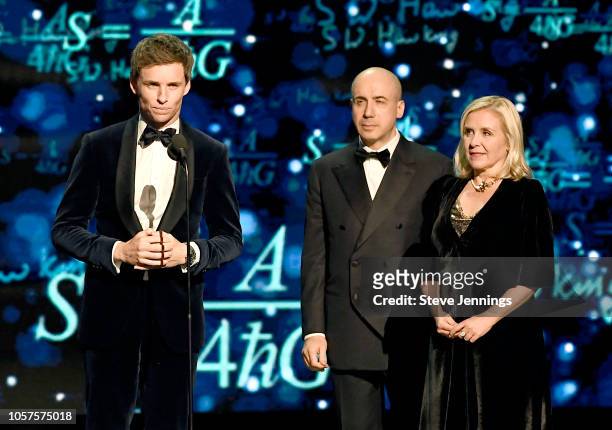 Eddie Redmayne, Yuri Milner and Lucy Hawking speak onstage at the 2019 Breakthrough Prize at NASA Ames Research Center on November 4, 2018 in...