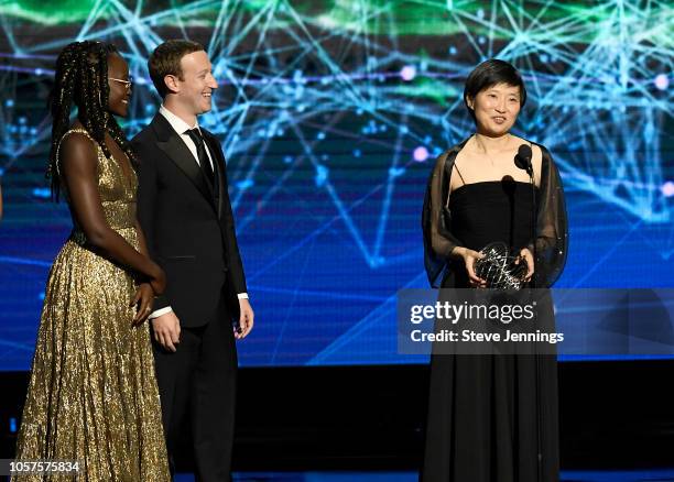 Lupita Nyong'o, Mark Zuckerberg and Xiaowei Zhuang, winner of Breakthrough Prize in Life Sciences, speak onstage at the 2019 Breakthrough Prize at...