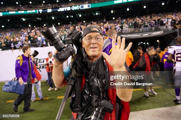 Sports Illustrated photographer John Iacono on sidelines after New York Jets vs Minnesota Vikings game. East Rutherford, NJ CREDIT: David Bergman