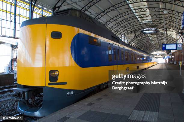 a typical dutch intercity train ready for departure - matthijs borghgraef fotografías e imágenes de stock