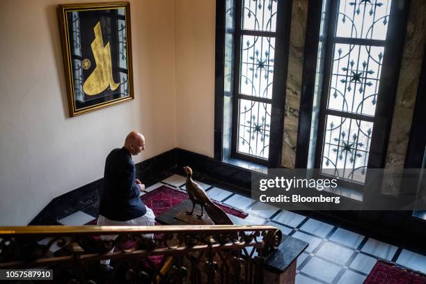 Ashraf Ghani, Afghanistan's president, center, walks up a flight of steps at the Presidential Palace in Kabul, Afghanistan, on Thursday, Nov. 1,...