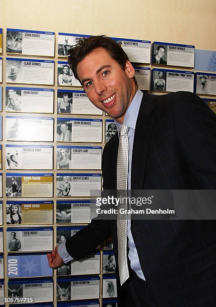 Grant Hackett reveals his name on the wall listing all the inductees to the Sport Australia Hall Of Fame during a press conference ahead of the 2010...