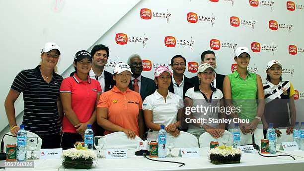 Players and Officials pose for photographs during the Sime Darby LPGA press conference on October 20, 2010 held at the Sime Darby Convention Centre...