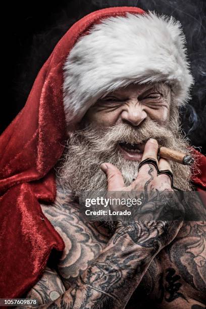 bad santa claus - bad christmas stock-fotos und bilder