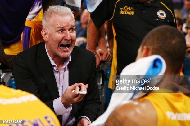 Kings head coach Andrew Gaze speaks to his players during the round four NBL match between Melbourne United and the Sydney Kings at Melbourne Arena...