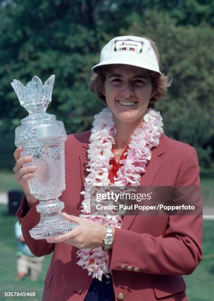 American professional golfer Beth Daniel with the trophy after winning the World Series of Women's Golf at The Country Club in Cleveland, Ohio on...