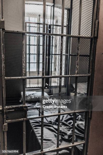 glimpse at the interior of an old jail. - sentencing stock pictures, royalty-free photos & images