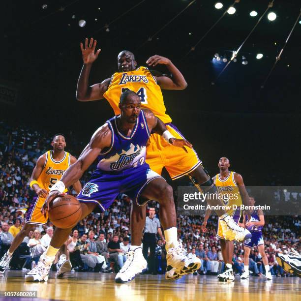 Karl Malone of the Utah Jazz dribbles during Game Four of the Western Conference Semifinals as part of the 1997 NBA Playoffs on May 10, 1997 at the...