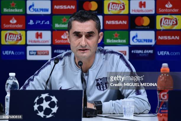 Barcelona's Spanish head coach Ernesto Valverde speaks during a press conference on November 5, 2018 at San Siro stadium, on the eve of the UEFA...