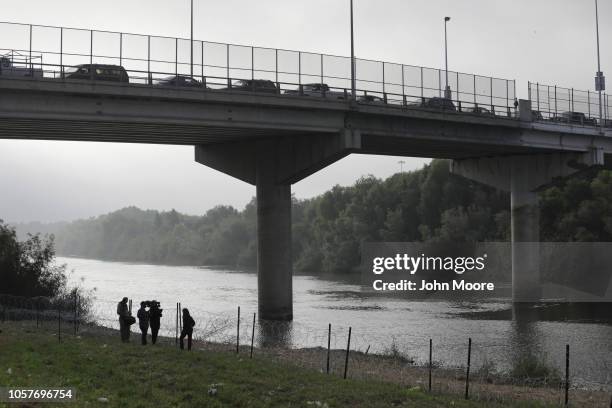 Crew films a live shot along the Rio Grande at the U.S.-Mexico border on November 5, 2018 in Hidalgo, Texas. U.S. President Donald Trump ordered U.S....