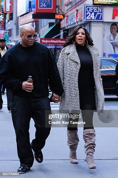 Television personality Wendy Williams and her husband Kevin Hunter leave the "Celebrity Apprentice" film set at Famiglia Restaurant on October 19,...