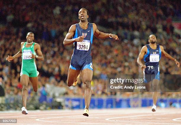 Michael Johnson of the USA crosses the line to win gold in Mens 400m Final at the Olympic Stadium on Day Ten of the Sydney 2000 Olympic Games in...
