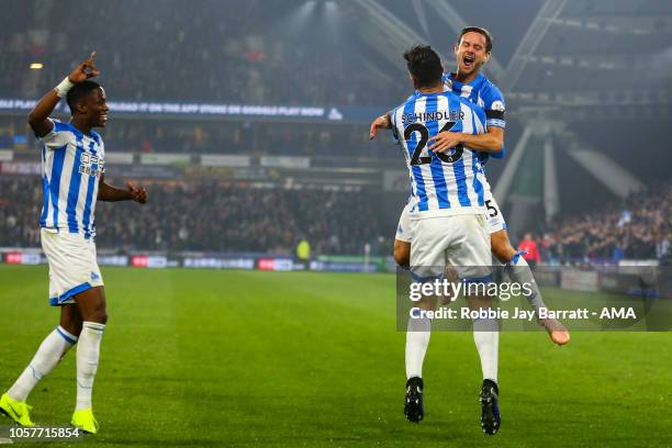 Christopher Schindler of Huddersfield Town celebrates after scoring a goal to make it 1-0 during the Premier League match between Huddersfield Town...