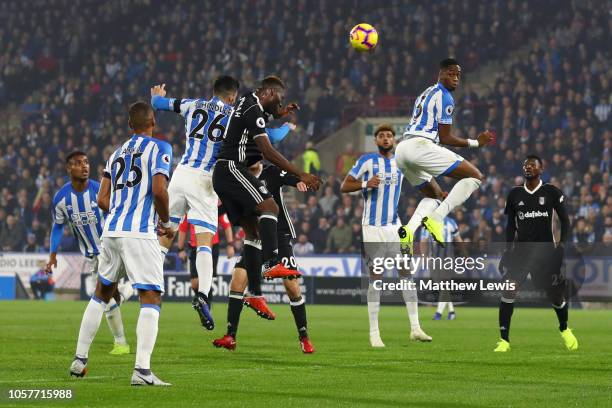 Christopher Schindler of Huddersfield Town scores his team's first goal during the Premier League match between Huddersfield Town and Fulham FC at...