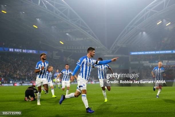 Christopher Schindler of Huddersfield Town celebrates after scoring a goal to make it 1-0 during the Premier League match between Huddersfield Town...