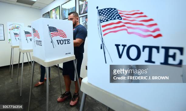 Voters cast their ballots for Early Voting at the Los Angeles County Registrar's Office in Norwalk, California on November 5 a day ahead the November...